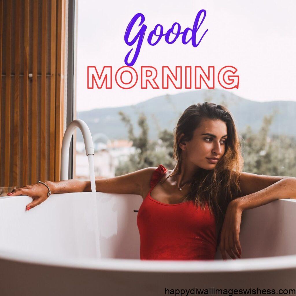 Beautiful girl in red dress in bath tub good morning
